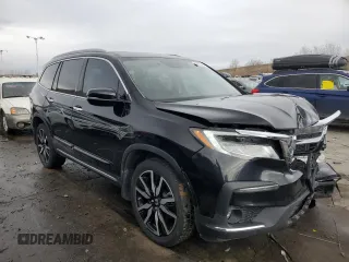 2022 Honda Pilot Touring 7-Passenger with VIN 5FNYF6H62NB084022, listed as a Copart auction lot 44793355 with 62,906 mi miles and Salvage Title. Bid and sale history available at carsss.com. Image 4.