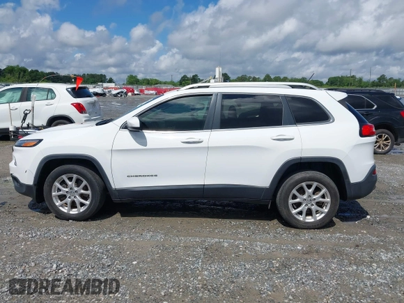 2018 Jeep Cherokee Latitude with VIN 1C4PJLCB1JD553390, listed as a IAAI auction lot 42233220 with 130,418 mi miles and . Bid and sale history available at DreamBid. Image 14.