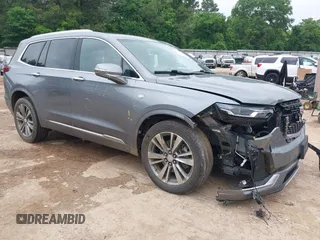 2022 Cadillac XT6 Premium Luxury with VIN 1GYKPCRS9NZ108656, listed as a IAAI auction lot 42110375 with 84,869 mi miles and . Bid and sale history available at DreamBid. Image 1.