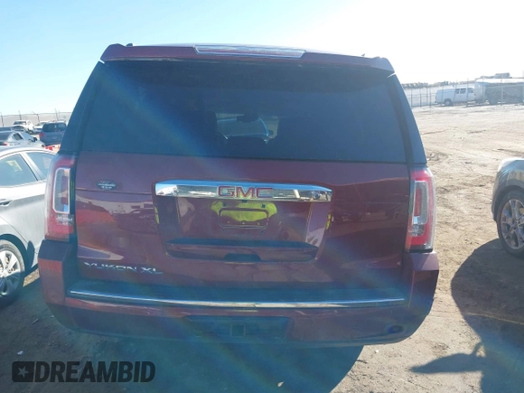 2018 GMC Yukon XL Denali with VIN 1GKS2HKJ3JR372473, listed as a IAAI auction lot 41637623 with 130,295 mi miles and . Bid and sale history available at DreamBid. Image 16.