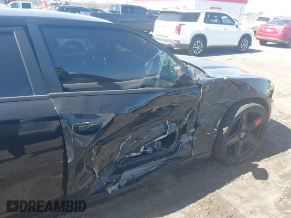 2020 Dodge Charger SXT with VIN 2C3CDXBG2LH229627, listed as a IAAI auction lot 41596342 with 124,012 mi miles and . Bid and sale history available at DreamBid. Image 17.