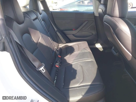 2018 Tesla Model 3 Long Range Battery with VIN 5YJ3E1EA0JF008351, listed as a IAAI auction lot 41129459 with 36,518 mi miles. Bid and sale history available at carsss.com. Image 8.