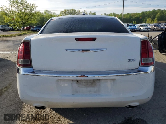 2012 Chrysler 300 Limited with VIN 2C3CCACGXCH216512, listed as a Copart auction lot 54104655 with 228,538 mi miles and Clean Title. Bid and sale history available at DreamBid. Image 6.