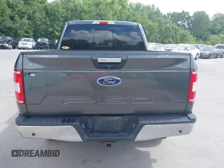 2018 Ford F-150 XL with VIN 1FTEW1E57JFA95086, listed as a IAAI auction lot 42574704 with 77,301 mi miles and . Bid and sale history available at DreamBid. Image 16.