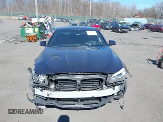 2013 BMW 5 Series 535i xDrive with VIN WBAFU7C52DDU70203, listed as a IAAI auction lot 41706253 with Not provided miles and . Bid and sale history available at DreamBid. Image 11.