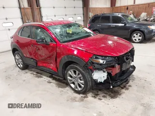 2023 Mazda CX-30 S Preferred z VIN 3MVDMBCM1PM549616, wystawiony jako IAAI lot #42453130 z przebiegiem 43 857 mil mil oraz . Historia ofert i sprzedaży dostępna na DreamBid. Obrazek 1.