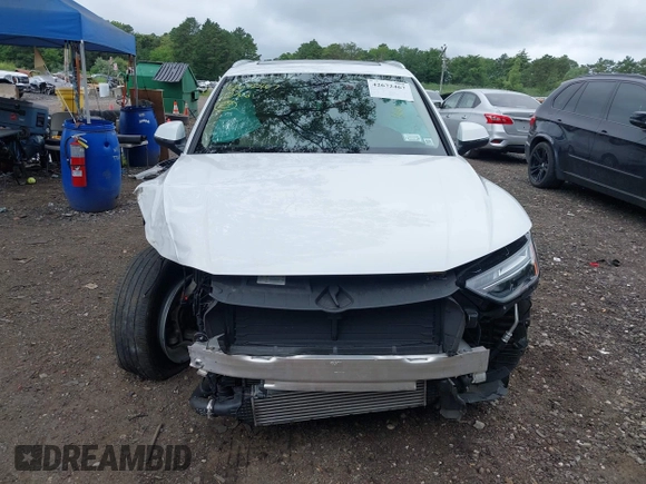 2022 Audi Q5 S line Premium z VIN WA1GAAFY2N2094208, wystawiony jako IAAI lot #42672467 z przebiegiem 26 301 mil mil oraz . Historia ofert i sprzedaży dostępna na DreamBid. Obrazek 12.
