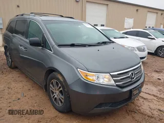 2011 Honda Odyssey EX-L with VIN 5FNRL5H66BB103352, listed as a IAAI auction lot 41901832 with 238,727 mi miles and . Bid and sale history available at carsss.com. Image 1.