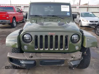 2016 Jeep Wrangler Unlimited Sahara with VIN 1C4BJWEGXGL249638, listed as a IAAI auction lot 41090024 with 98,345 mi miles and . Bid and sale history available at DreamBid. Image 13.