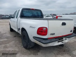 2002 Ford F-150 XL with VIN 1FTRX07262KB49014, listed as a IAAI auction lot 41518904 with 1 mi miles. Bid and sale history available at carsss.com. Image 3.