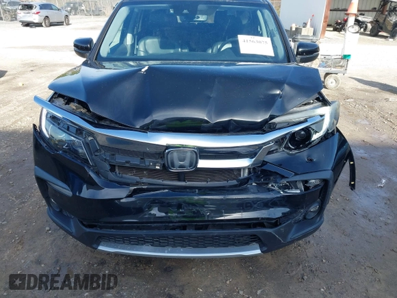 2020 Honda Pilot EX-L with VIN 5FNYF5H52LB003289, listed as a IAAI auction lot 41563075 with 151,682 mi miles. Bid and sale history available at carsss.com. Image 12.