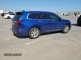 2023 Cadillac XT6 FWD Luxury z VIN 1GYKPAR42PZ167668, wystawiony jako Copart lot #53278075 z przebiegiem 32 212 mil mil oraz Szkoda całkowita • Salvage title. Historia ofert i sprzedaży dostępna na DreamBid. Obrazek 3.