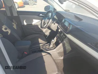 2023 Volkswagen Taos SE z VIN 3VVNX7B29PM345710, wystawiony jako IAAI lot #41805268 z przebiegiem 27 783 mil mil oraz . Historia ofert i sprzedaży dostępna na DreamBid. Obrazek 5.