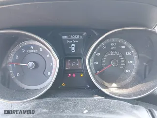 2013 Hyundai Elantra GT with VIN KMHD35LE9DU058163, listed as a IAAI auction lot 42067923 with 180,638 mi miles. Bid and sale history available at carsss.com. Image 7.