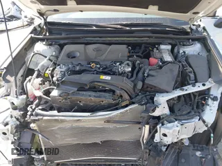 2023 Toyota Camry SE with VIN 4T1T11AK8PU138805, listed as a IAAI auction lot 41977827 with 19,661 mi miles and . Bid and sale history available at DreamBid. Image 10.