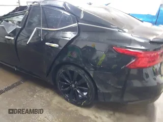 2017 Nissan Maxima S with VIN 1N4AA6AP8HC381466, listed as a IAAI auction lot 41552326 with 137,161 mi miles and . Bid and sale history available at DreamBid. Image 13.