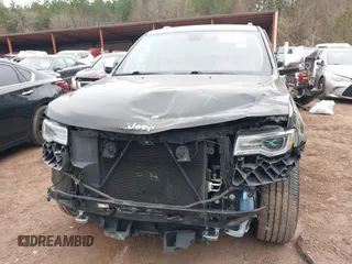 2017 Jeep Grand Cherokee Overland z VIN 1C4RJECG4HC878258, wystawiony jako IAAI lot #41361352 z przebiegiem 137 574 mil mil oraz . Historia ofert i sprzedaży dostępna na DreamBid. Obrazek 6.