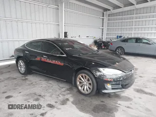 2017 Tesla Model S 60 z VIN 5YJSA1E17HF179051, wystawiony jako IAAI lot #42430013 z przebiegiem 201 174 mil mil oraz . Historia ofert i sprzedaży dostępna na DreamBid. Obrazek 1.