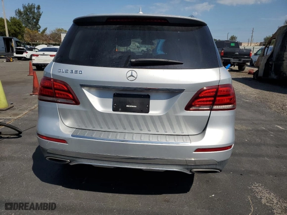 2016 Mercedes-Benz GLE with VIN 4JGDA5JB0GA662351, listed as a Copart auction lot 49371685 with 74,153 mi miles and Salvage Title. Bid and sale history available at carsss.com. Image 6.