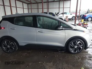 2023 Chevrolet Bolt EV 1LT z VIN 1G1FW6S05P4169385, wystawiony jako IAAI lot #42134812 z przebiegiem 41 205 mil mil oraz . Historia ofert i sprzedaży dostępna na DreamBid. Obrazek 13.