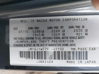 2016 Mazda Mazda6 i Grand Touring with VIN JM1GJ1W57G1441102, listed as a IAAI auction lot 41687057 with 144,876 mi miles. Bid and sale history available at carsss.com. Image 9.