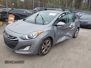 2014 Hyundai Elantra GT with VIN KMHD35LH6EU165019, listed as a IAAI auction lot 42016057 with 121,794 mi miles. Bid and sale history available at carsss.com. Image 17.