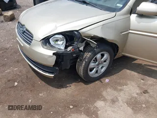 2006 Hyundai Accent GLS with VIN KMHCN46C26U037605, listed as a IAAI auction lot 42431996 with 86,128 mi miles and . Bid and sale history available at DreamBid. Image 6.