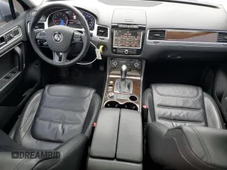 2014 Volkswagen Touareg Sport с VIN WVGEF9BP0ED014429, выставлен на аукционе Copart как лот 58692875 с пробегом 157 417 миль миль и Списание • Salvage title. История ставок и продаж доступна на DreamBid. Изображение 8.