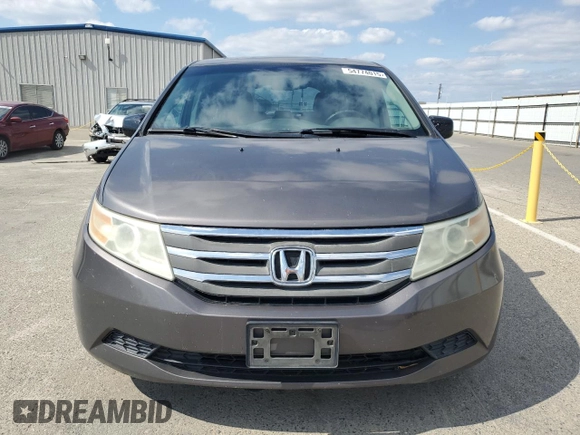 2011 Honda Odyssey EX-L with VIN 5FNRL5H61BB056652, listed as a Copart auction lot 54774015 with 233,125 mi miles and Salvage Title. Bid and sale history available at DreamBid. Image 5.