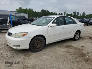 2004 Toyota Camry LE z VIN JTDBE32K440281087, wystawiony jako Copart lot #60486995 z przebiegiem 229 856 mil mil oraz Czysty tytuł • Clean title. Historia ofert i sprzedaży dostępna na DreamBid. Obrazek 1.