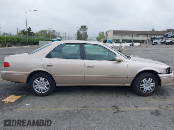 2001 Toyota Camry CE with VIN 4T1BG22K81U075758, listed as a IAAI auction lot 42024950 with 107,439 mi miles. Bid and sale history available at carsss.com. Image 13.