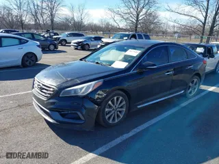 2016 Hyundai Sonata 2.4L Sport with VIN 5NPE34AF1GH410309, listed as a IAAI auction lot 38677619 with 233,330 mi miles. Bid and sale history available at carsss.com. Image 2.