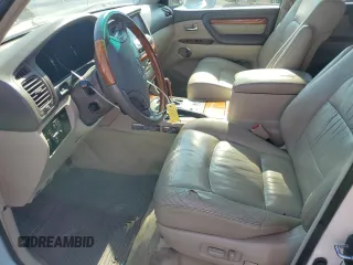 2004 Lexus LX 470 with VIN JTJHT00W243539249, listed as a Copart auction lot 70493974 with 181,155 mi miles and Clean Title. Bid and sale history available at DreamBid. Image 7.