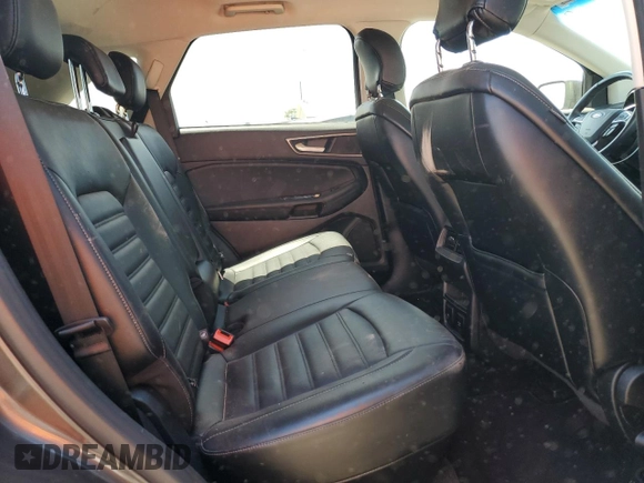 2016 Ford Edge SEL z VIN 2FMPK4J80GBC17489, wystawiony jako Copart lot #58372985 z przebiegiem 131 423 mil mil oraz Szkoda całkowita • Salvage title. Historia ofert i sprzedaży dostępna na DreamBid. Obrazek 11.