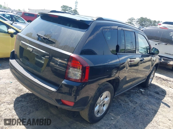 2014 Jeep Compass Sport with VIN 1C4NJCBA0ED511217, listed as a IAAI auction lot 42008976 with 210,780 mi miles. Bid and sale history available at carsss.com. Image 4.
