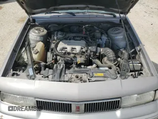 1996 Oldsmobile Cutlass Ciera 1SA VX5 z VIN 1G3AJ55M2T6354131, wystawiony jako Copart lot #74458314 z przebiegiem 55 998 mil mil oraz Szkody całkowita. Historia ofert i sprzedaży dostępna na DreamBid. Obrazek 11.