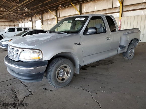 2003 Ford F-150 XL with VIN 1FTRX07233KD43811, listed as a Copart auction lot 85113414 with 215,390 mi miles and Salvage Title. Bid and sale history available at carsss.com. Image 1.