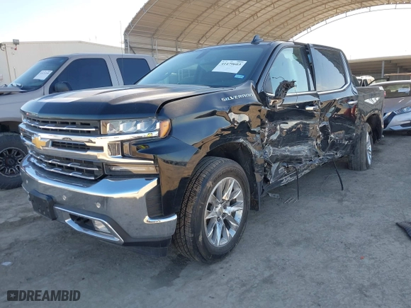 2019 Chevrolet Silverado 1500 LTZ with VIN 1GCPWEED4KZ102552, listed as a IAAI auction lot 41479603 with 104,913 mi miles. Bid and sale history available at carsss.com. Image 2.
