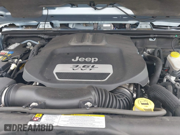 2012 Jeep Wrangler Arctic with VIN 1C4AJWBG7CL148325, listed as a IAAI auction lot 39943602 with 86,625 mi miles and . Bid and sale history available at DreamBid. Image 10.
