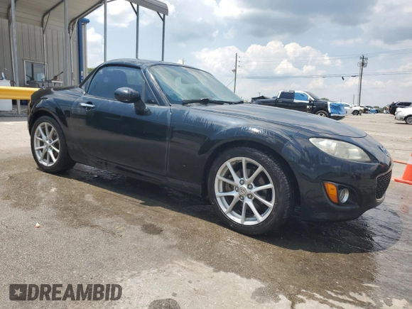 2009 Mazda MX-5 Miata Grand Touring with VIN JM1NC26F390204924, listed as a Copart auction lot 63492955 with 215,707 mi miles and Salvage title. Bid and sale history available at DreamBid. Image 4.
