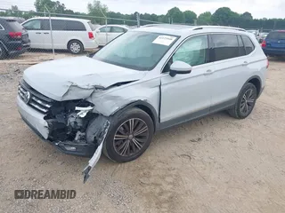 2018 Volkswagen Tiguan SEL z VIN 3VV3B7AXXJM039125, wystawiony jako IAAI lot #42125540 z przebiegiem 91 551 mil mil oraz . Historia ofert i sprzedaży dostępna na DreamBid. Obrazek 2.