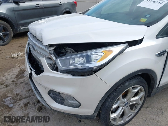 2019 Ford Escape Titanium with VIN 1FMCU9J97KUB85528, listed as a IAAI auction lot 41708344 with 88,841 mi miles. Bid and sale history available at carsss.com. Image 6.