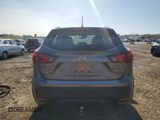 2017 Nissan Rogue SV with VIN JN1BJ1CR5HW135847, listed as a Copart auction lot 59091395 with 75,509 mi miles and Salvage title. Bid and sale history available at DreamBid. Image 6.