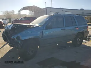 1994 Jeep Grand Cherokee Laredo with VIN 1J4FX58S1RC334178, listed as a Copart auction lot 75943554 with 165,435 mi miles and Clean Title. Bid and sale history available at carsss.com. Image 1.