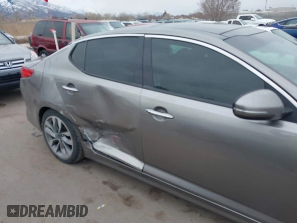 2014 Kia Optima SXL Turbo with VIN 5XXGR4A69EG312273, listed as a IAAI auction lot 41729863 with 107,660 mi miles and . Bid and sale history available at DreamBid. Image 6.
