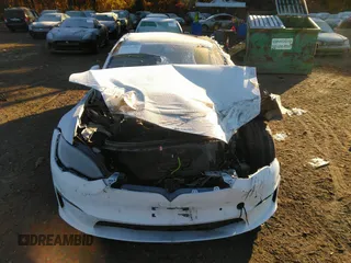 2022 Tesla Model S with VIN 5YJSA1E54NF488023, listed as a IAAI auction lot 36074023 with 200 mi miles and . Bid and sale history available at DreamBid. Image 11.