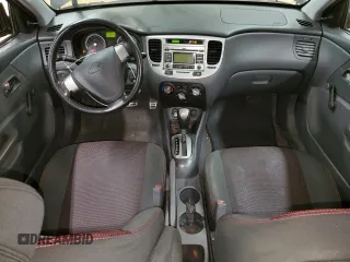 2009 Kia Rio LX with VIN KNADE243896580883, listed as a Copart auction lot 43735505 with 135,726 mi miles and Salvage Title. Bid and sale history available at carsss.com. Image 8.