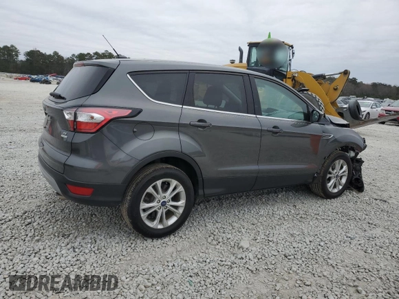 2017 Ford Escape SE with VIN 1FMCU0GD5HUC67421, listed as a Copart auction lot 86633734 with 82,929 mi miles and Salvage Title. Bid and sale history available at DreamBid. Image 3.