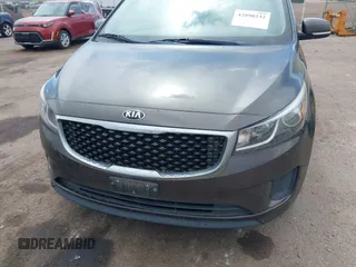 2015 Kia Sedona LX with VIN KNDMB5C13F6072586, listed as a IAAI auction lot 42090232 with 125,818 mi miles. Bid and sale history available at carsss.com. Image 6.