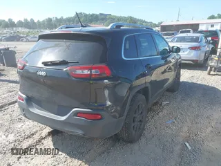 2016 Jeep Cherokee Latitude with VIN 1C4PJMCB2GW236835, listed as a IAAI auction lot 42698119 with 111,985 mi miles and . Bid and sale history available at DreamBid. Image 4.